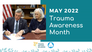 Governor Carney signs a proclamation and First Lady Tracey Quillen May 2022 Trauma Awareness Month 2022